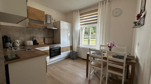 Kuchyň nebo kuchyňský kout v ubytování Ferienwohnung Kaiserblick