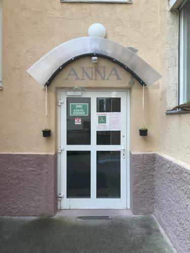 an entrance to a building with a glass door at Pension&Hostel Anna - Monteurzimmer -------- 10 minutes walk to Oktoberfest in Munich