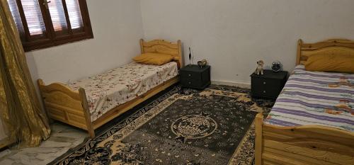 Ένα ή περισσότερα κρεβάτια σε δωμάτιο στο Villa Atlas Oasis