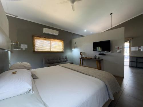 Postel nebo postele na pokoji v ubytování Birds Babble Self Catering