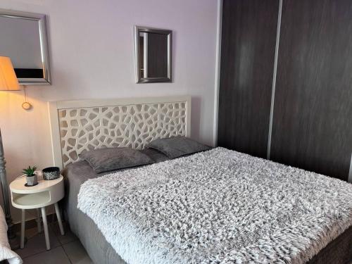 Ένα ή περισσότερα κρεβάτια σε δωμάτιο στο Residence Anse des sables