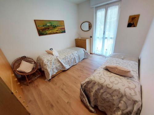 Ένα ή περισσότερα κρεβάτια σε δωμάτιο στο Sunset House Perledo