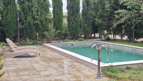 Πισίνα στο ή κοντά στο Green Garden Shuvelan