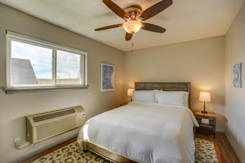 a bedroom with a bed and a ceiling fan at Pet Friendly Free Parking Near Medical Center in West Allis
