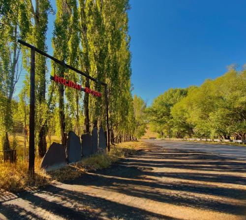 an empty road with a sign on the side of it at Azoyan Holiday Resort in Sisian