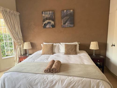 Ένα ή περισσότερα κρεβάτια σε δωμάτιο στο Aqua View Riverside Guesthouse