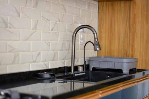 Køkken eller tekøkken på CASA BALI 400 mtrs Thermas