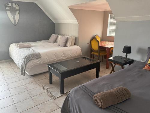 Ένα ή περισσότερα κρεβάτια σε δωμάτιο στο Aqua View Riverside Guesthouse