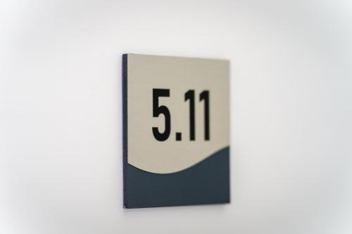 a clock with the number on it at Hotel Waibstadter Hof in Waibstadt