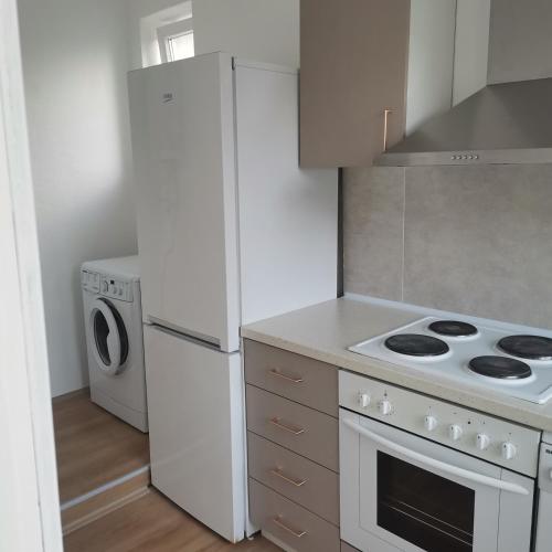 Küche/Küchenzeile in der Unterkunft Zenith Apartment