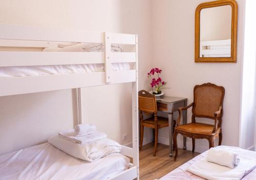 Ένα ή περισσότερα κρεβάτια σε δωμάτιο στο Le Clos Poncétys - Villa avec Piscine By Primo