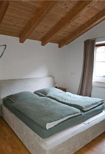 Ein Bett oder Betten in einem Zimmer der Unterkunft Zilleralps Fewo