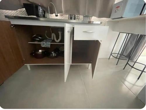 Dapur atau dapur kecil di Sobrado Novo n 02 com Terraço Panorâmico e Churrasqueira - 4 min a pe ate a Praia - Condomínio Sobre as Ondas