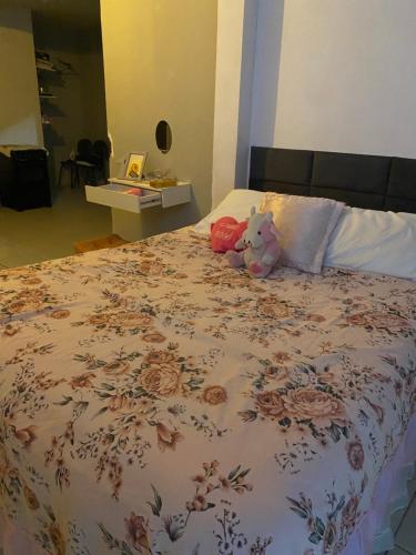 Postel nebo postele na pokoji v ubytování zona norte Natal Kit Net próximo Norte Shopping