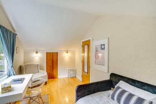 a living room with a couch and a table at Private cottage close to shopping dining and skiing in Austerlitz