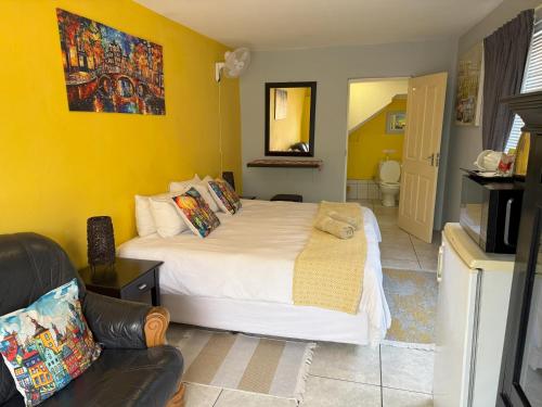 Ένα ή περισσότερα κρεβάτια σε δωμάτιο στο Aqua View Riverside Guesthouse