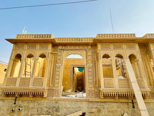 a building with ornate detailing on the facade at Hotel Golden Safari in Jaisalmer
