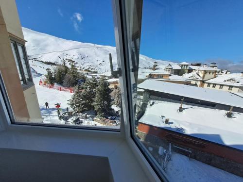 Apartamentos en la Plaza de Sierra Nevada Impala 2C Parking incluido