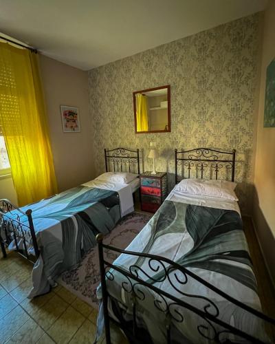 Postel nebo postele na pokoji v ubytování Hotel Continental Cassino