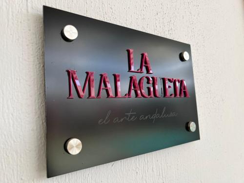 Ein Zertifikat, Auszeichnung, Logo oder anderes Dokument, das in der Unterkunft Rosa y Oro Hotel Boutique ausgestellt ist