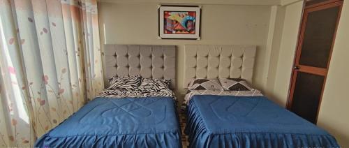Katil atau katil-katil dalam bilik di Hostal Casa Blanca