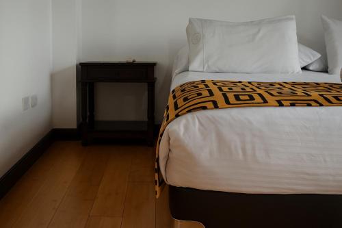 Ein Bett oder Betten in einem Zimmer der Unterkunft Mongui Plaza Hotel