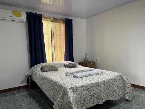 Postel nebo postele na pokoji v ubytování Hostel Cora Chía