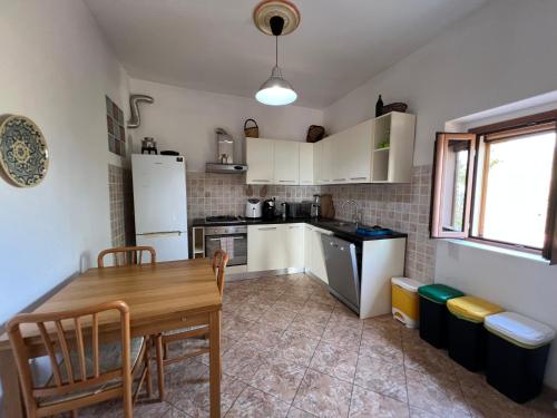 Dapur atau dapur kecil di Casa vacanze Antico Mulino