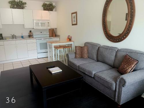 a living room with a couch and a table at The Cozy Inn in St. Augustine