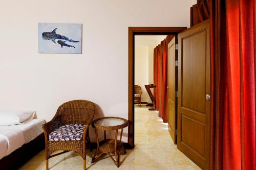 Ένα ή περισσότερα κρεβάτια σε δωμάτιο στο Central Place Hotel