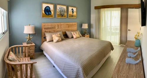Ένα ή περισσότερα κρεβάτια σε δωμάτιο στο Maple Beach Residences Punta Cana
