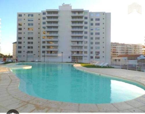 Πισίνα στο ή κοντά στο Departamento Condominio Serena Pacifico