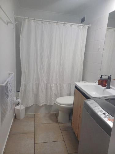 Ένα μπάνιο στο Departamento Condominio Serena Pacifico