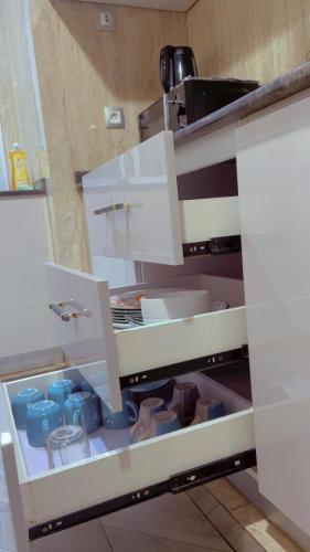 Η κουζίνα ή μικρή κουζίνα στο Appartement meublé haut standing et sécurisé