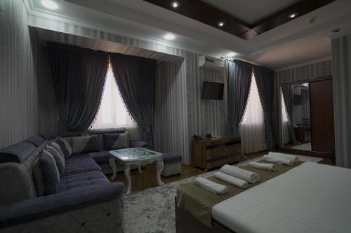 Ένα ή περισσότερα κρεβάτια σε δωμάτιο στο Hotel Ayyub Sultan