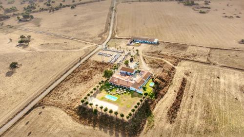 an aerial view of a building in a field at Monte da Oliveirinha in Évora