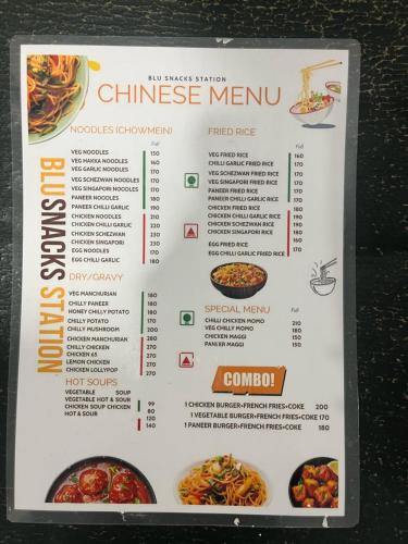 a menu for a chinese meal in a restaurant at Hotel Lagoon Inn - Malviya Nagar in New Delhi