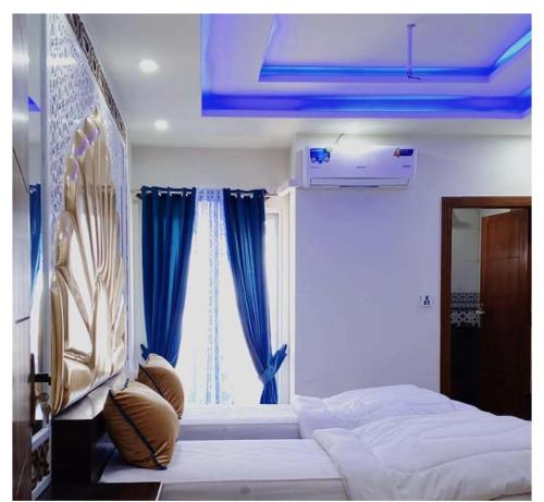 Кровать или кровати в номере Paklodge