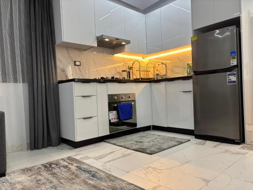 Dapur atau dapur kecil di Elyasmin شاليه الياسمين في هلنان بورفؤاد