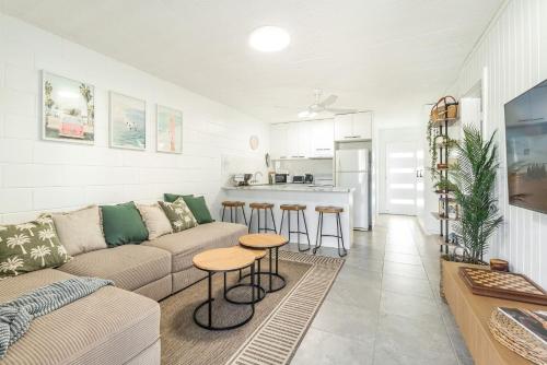 a living room with a couch and a table at Iluka Villa 4 in Iluka