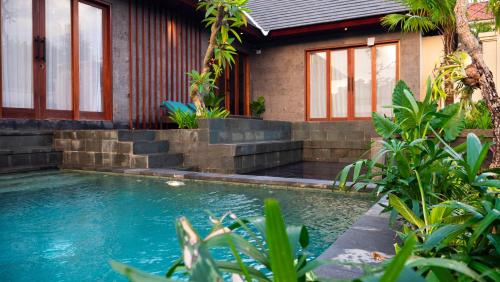 Πισίνα στο ή κοντά στο The Kanda Villa Ubud