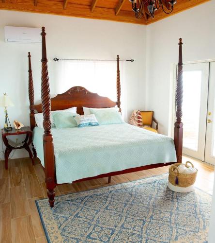Ένα ή περισσότερα κρεβάτια σε δωμάτιο στο Blue Love Point home