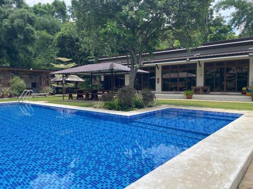 Bazén v ubytování Minoah's Private Resort La Union nebo v jeho okolí