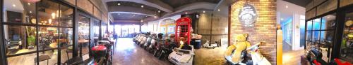 a room filled with lots of parked motorcycles in a store at TK Happiness 168 B&B in Donggang