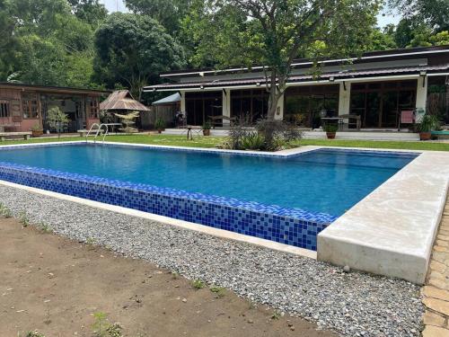 Bazén v ubytování Minoah's Private Resort La Union nebo v jeho okolí