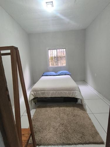 Llit o llits en una habitació de Casa espaçosa