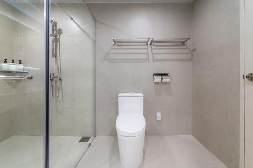 a bathroom with a toilet and a shower at Hotel Modak Namdaemun in Seoul