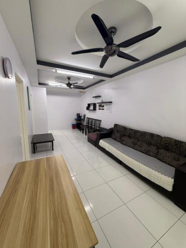 Χώρος καθιστικού στο DND Homestay Sitiawan