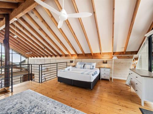 Ένα ή περισσότερα κρεβάτια σε δωμάτιο στο Osprey Beachside Retreat - Good Times Guaranteed