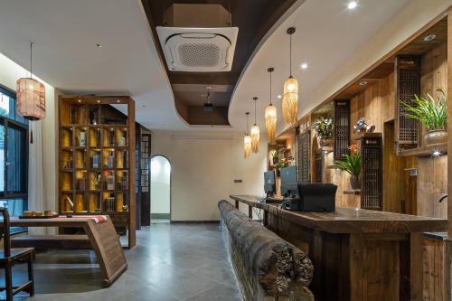 Floral Hotel Shexian Taibaiju B&B Huizhou Ancient City Branchにあるシーティングエリア